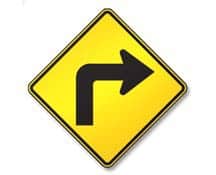 Road ahead makes a sharp turn to the direction of the arrow (right). Slow down, keep right, and do not pass.