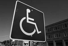 Slow your speed and watch for persons who may be disabled or who may be crossing the roadway in a wheelchair