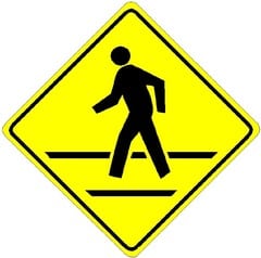 Used at a marked crosswalk or in advance of locations where pedestrians may be crossing your path