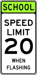 When approaching a school zone, a reduced speed limit is in effect when the yellow lights are flashing