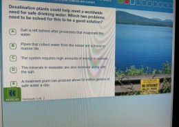 What are two problems that need to be solved for desalination plants to be a good solution to meet a worldwide need for safe drinking water?