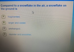 Compared to a snowflake in the air, a snowflake on the ground is …